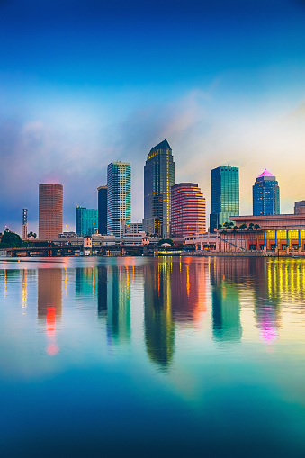The skyscrapers of Downtown Tampa reflected in the water few minutes before the sunrise.