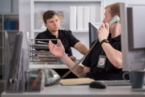 Image of policeman talking on the phone